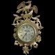 English Cartel clock that had been gold painted.