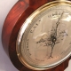 Rare English fusee wall clock incorporating a mercurial barometer.