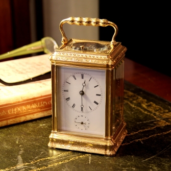 A very fine engraved carriage clock.