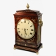 A good Regency, gadrooned chamfer top bracket clock in an elaborate mahogany case. Circa 1815.