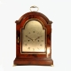 Small bracket or table clock by Perigal of London. Having a mahogany case and silvered dial. Circa 1