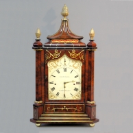 A large, quarter chiming bracket clock in an inlaid mahogany case. Circa 1850.