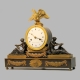 A French striking mantel clock in a classical style case. Circa 1820.