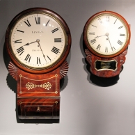 A small therefore rare, fusee, English Drop-dial wall clock in a mahogany case. Circa 1845.