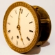 A small, English fusee, bronze and ormolu mantel timepiece by Baetens, London. Circa 1825.