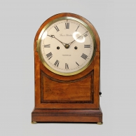 Arched fusee bracket clock in a mixed wood case. Signed francis Robotham, Hampstead. Circa 1800.