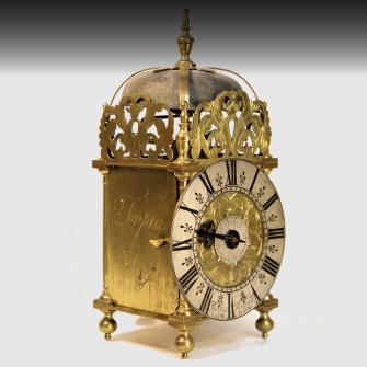 A small lantern timepiece/alarum wall clock by Ambrose Vowell, London. Circa 1730.