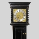 A fine and early English, panelled ebony longcase clock by John Drew, London. Circa 1685.