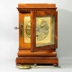English 5 glass, satinwood library clock with a chain fusee movement and engine turned gilded dial. 