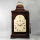 Georgian bracket clock in a mahogany bell top case. Made by Watson, London. Circa 1790.