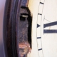 An early, wooden dial, English dial wall clock in a mahogany case. Made by Sly, Weymouth. Circa 1815