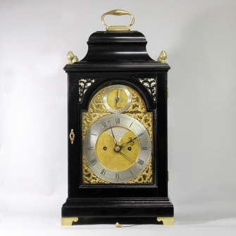 VERGE BRACKET CLOCK BY JOHN TAYLOR, LONDON. IN AN EBONISED BELL-TOP CASE. CIRCA 1780.