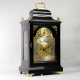 VERGE BRACKET CLOCK BY JOHN TAYLOR, LONDON. IN AN EBONISED BELL-TOP CASE. CIRCA 1780.