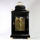 VERGE BRACKET CLOCK BY JOHN TAYLOR, LONDON. IN AN EBONISED BELL-TOP CASE. CIRCA 1780.