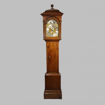 An oak Longcase clock with a brass dial. Made by George Clapham of Whitton (Lincolnshire). Circa 173