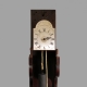 Very Small hooded wall clock with a silvered dial and in a mahogany case. By George Buckmaster of Ro