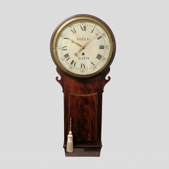 Small mahogany tavern clock with a white wooden dial. Made by Thomas Field of Bath. Circa 1790.