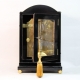 A good, small, Regency table clock in an ebony veneered case. By Louis Recordon, circa 1820.