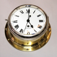 Good quality 'Air Ministry' ship's bulkhead clock with enamel dial and brass case. Ci