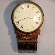 Striking Fusee, English 'Drop-dial' wall clock in an inlaid mahogany case. Circa 1825.