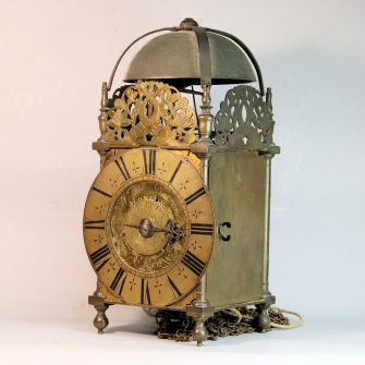 English Lantern clock with verge escapement and alarm. By William Barrow, London. Circa 1715.