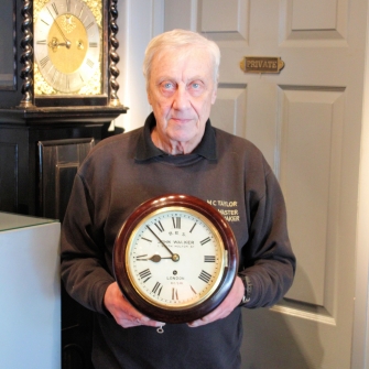 A fusee railway wall clock with an 8" dial. Formerly of Lymington Town Station (Hampshire). Cir