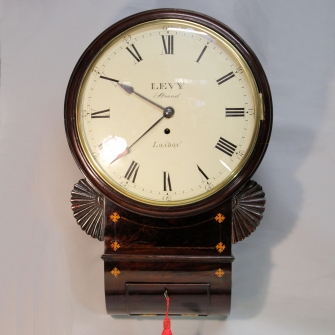 A fine English fusee, drop-dial wall clock with a wooden dial. Regency reriod, circa 1820.