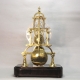 A rare and small, English skeleton clock of unusual style, by Richard Winter of Chieveley. Circa 186