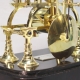 A rare and small, English skeleton clock of unusual style, by Richard Winter of Chieveley. Circa 186