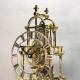 A rare and small, English skeleton clock of unusual style, by Richard Winter of Chieveley. Circa 186