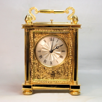 A substantial and fine, English fusee, striking carriage clock. By Cousens & Whiteside, London.